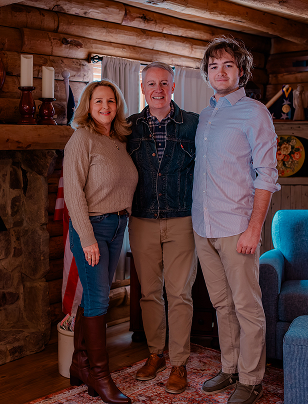 Greg Goode standing with his family